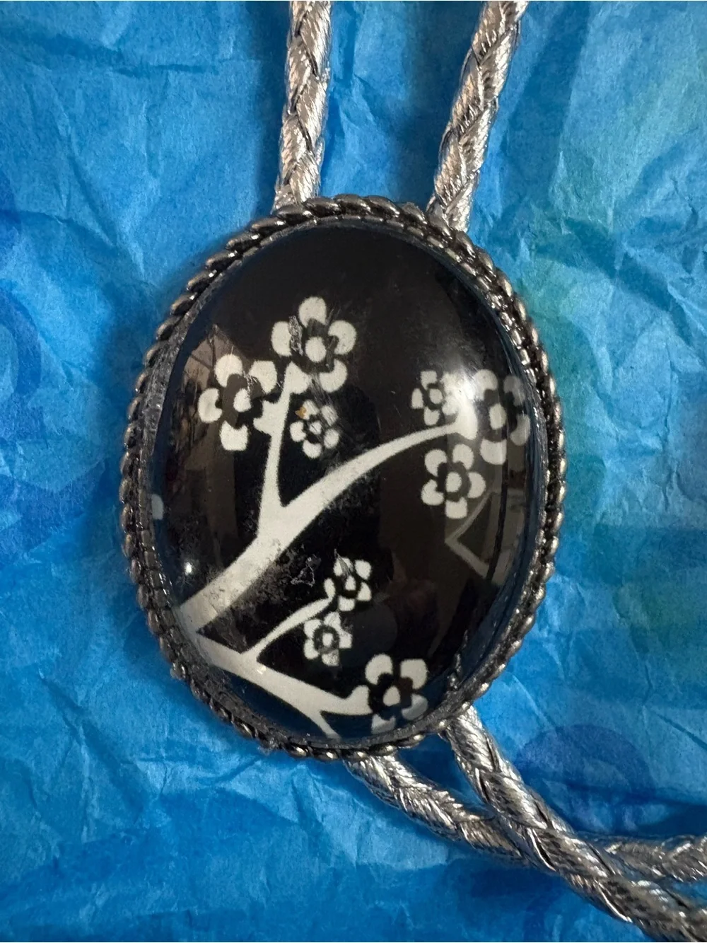 Black Floral Oval Pendant Bolo Tie